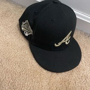 Stylish Black Cap with Gold Accents